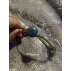 Bourbon and Bowties Bracelet Women Wire Bangle Blue Stone Gold Tone 2.5"